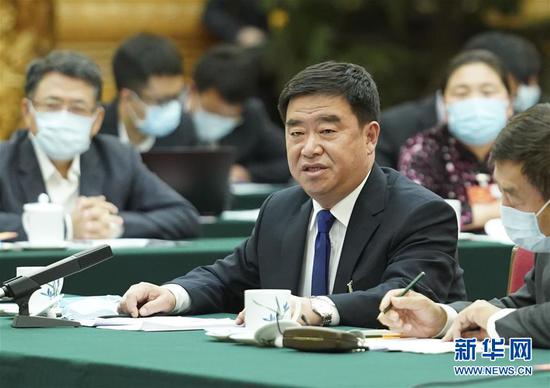 5月22日，全國人大代表薛志國參加內(nèi)蒙古代表團(tuán)的審議并發(fā)言。新華社記者 黃敬文 攝