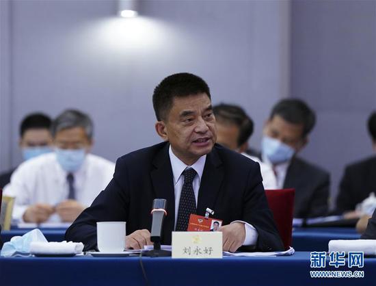  5月23日，全國政協(xié)委員劉永好在政協(xié)聯(lián)組會(huì)上發(fā)言。新華社記者 謝環(huán)馳 攝