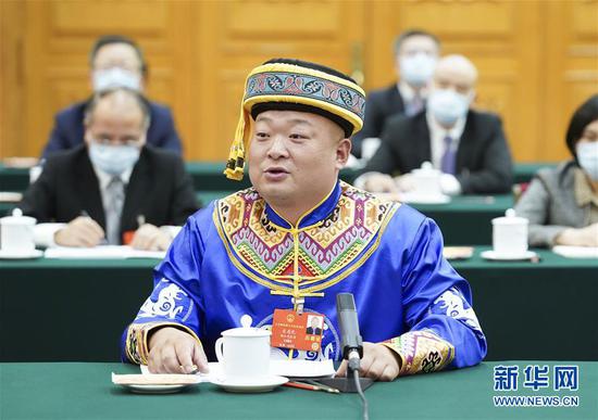  5月24日，全國人大代表宋慶禮參加湖北代表團(tuán)的審議并發(fā)言。新華社記者 黃敬文 攝